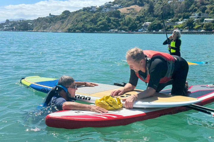 Learn different ways to get back on your board if you fall off, and assist rescue others in trouble from your paddleboard on our Paddle Nelson safety course