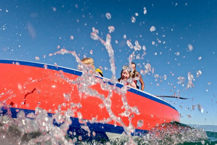 Splash around on the mega sup at paddle nelson