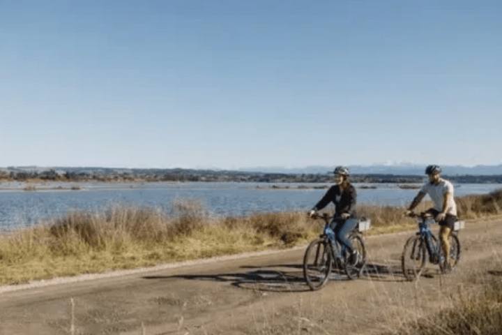 Cycling and paddle boarding in the same day at Tahunanui in Nelson